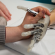 Illustration for article titled This cybernetic hand is the first to give amputees a sense of touch